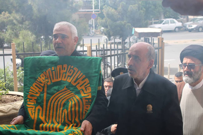 آئین پرچم‌گردانی گنبد حرم امام علی بن موسی الرضا(ع) در مسجد مرکز فقهی ائمه اطهار(ع)