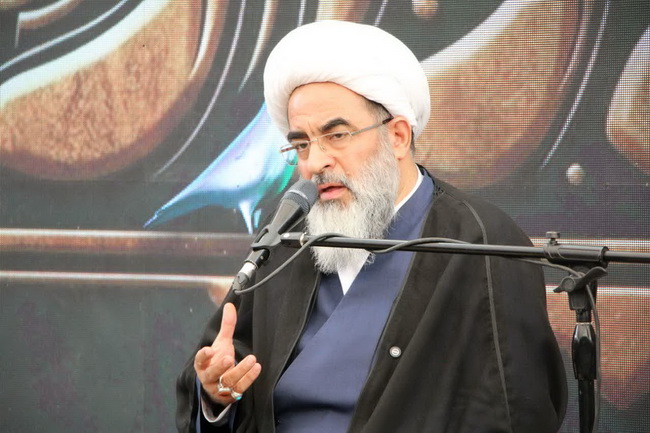 مراسم تعویض پرچم گنبد امامزاده موسی مبرقع(ع) در آستانه شهادت امام جواد(ع)