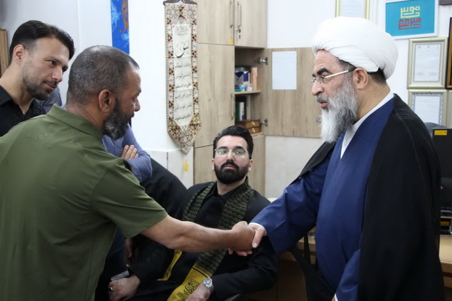 مراسم تعویض پرچم گنبد امامزاده موسی مبرقع(ع) در آستانه شهادت امام جواد(ع)